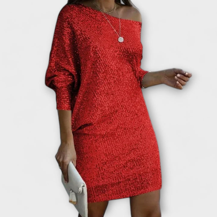 Sukienka na imprezę z cekinami i kontrastem