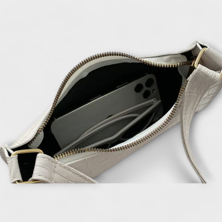 Cécile. - Błyszcząca skórzana torba