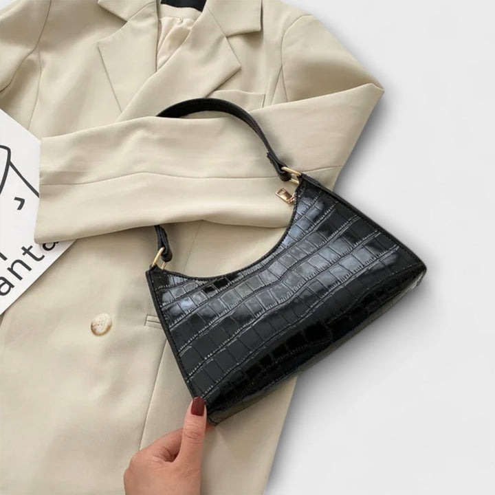 Cécile. - Błyszcząca skórzana torba