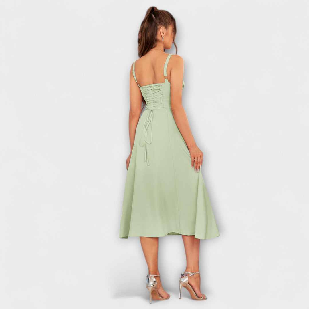 Nadzieja - Różowa sukienka z detalem rozcięcia