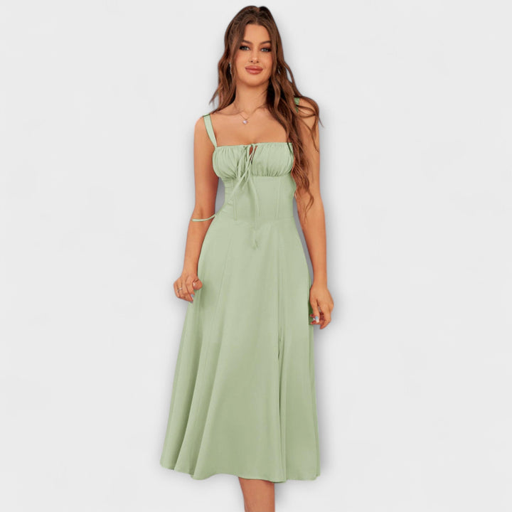 Nadzieja - Różowa sukienka z detalem rozcięcia