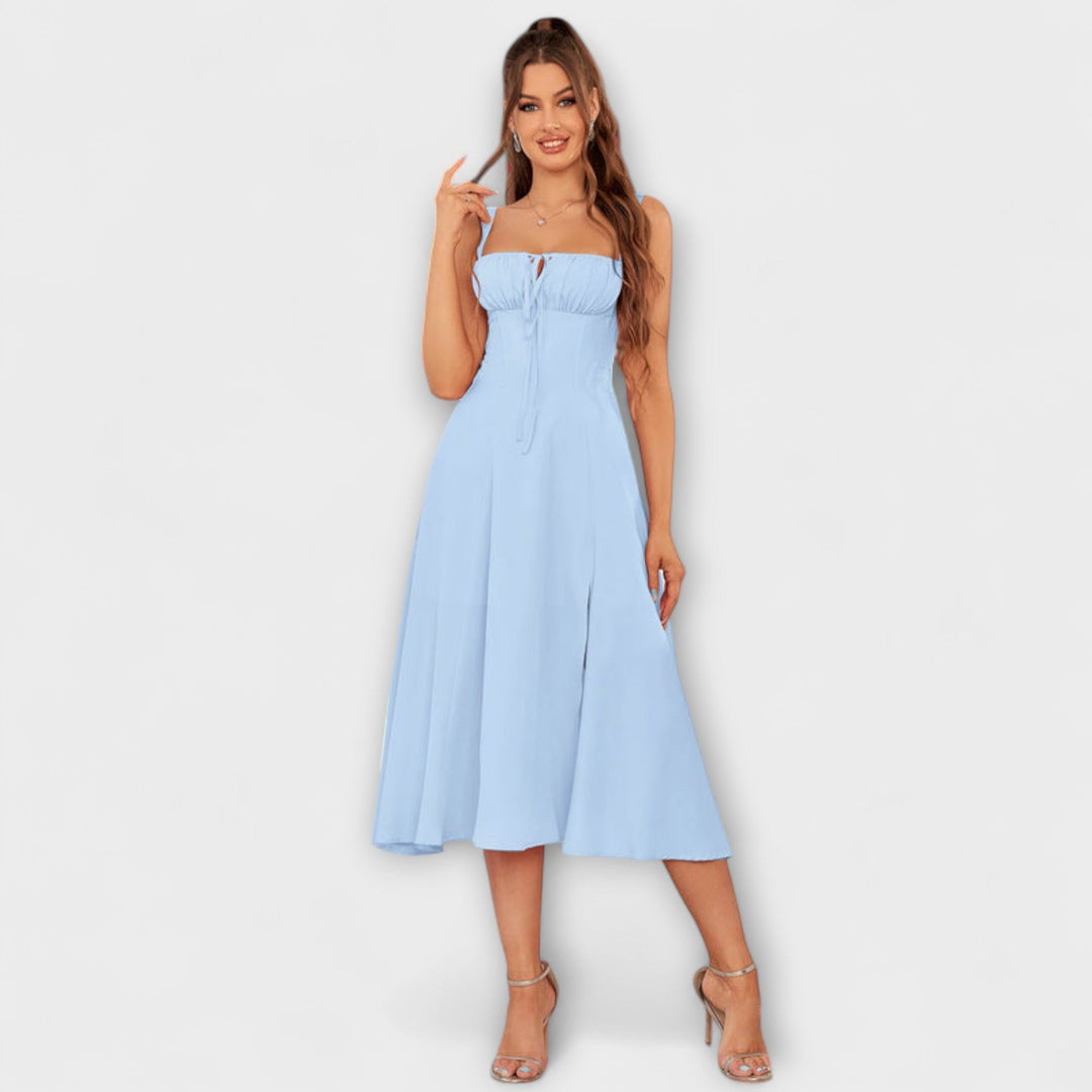 Nadzieja - Różowa sukienka z detalem rozcięcia