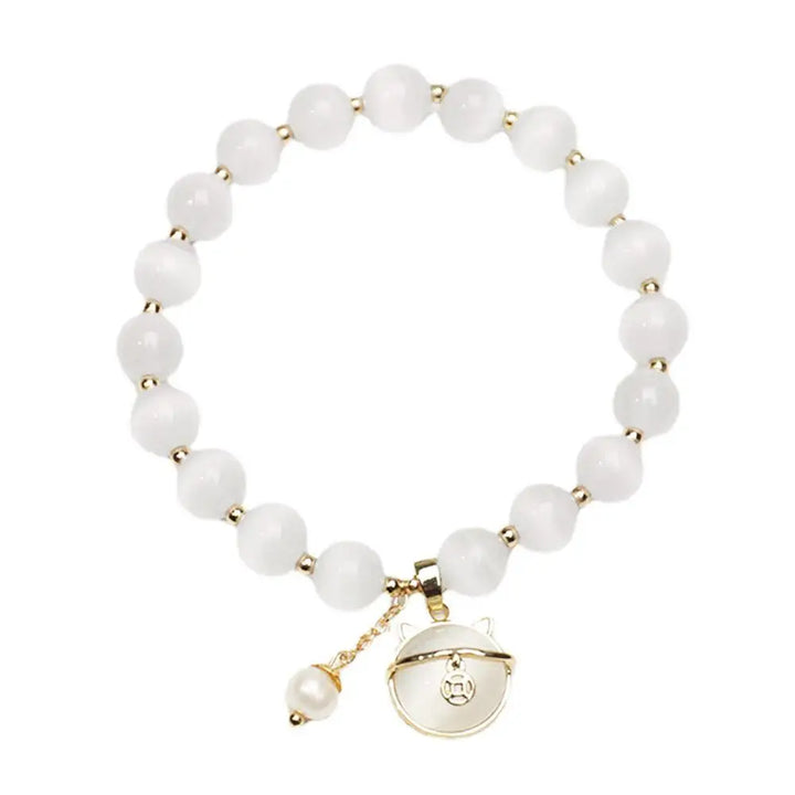 Bransoletka z koralikami i zawieszką szczęśliwego kota