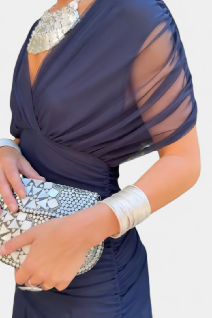 Eryzziah – Elegancka sukienka w kwiatowy wzór